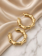 Boucles d'oreilles créoles effet bambou dorées en acier inoxydable