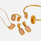 Parure (Collier, bracelet, boucles d'oreilles et bague) en acier inoxydable doré et pierre rose