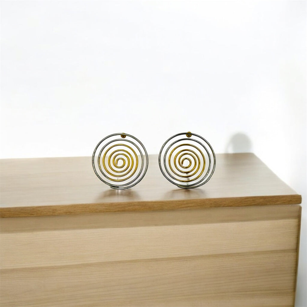 Boucles d’oreilles spirales bicolores en métal