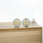 Boucles d’oreilles spirales bicolores en métal