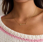 Collier trombone fin en acier inoxydable doré