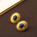 Boucles d’oreilles soleil en acier inoxydable avec pierre bleue