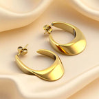 Boucles d’oreilles créoles sculptées en acier inoxydable