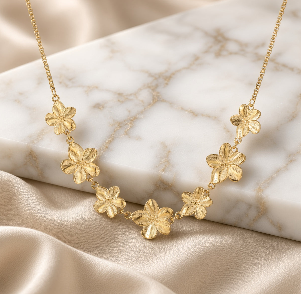 Collier fleurs dorées en acier inoxydable à sept motifs floraux