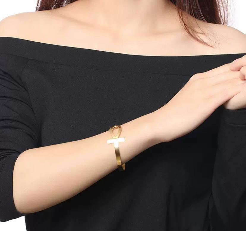 Bracelet croix Ankh en acier inoxydable doré
