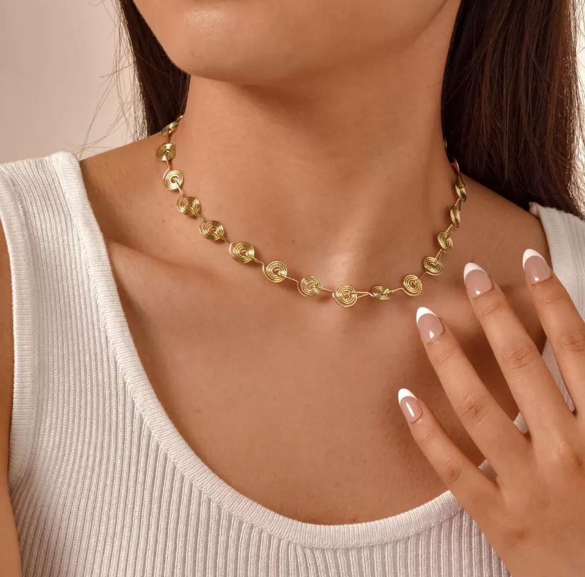 Parure collier et bracelet spirales en acier inoxydable