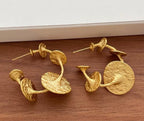 Boucles d'oreilles fantaisie dorées à disques martelés