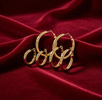 Steel earring plated with fine gold