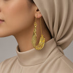 Boucles d’oreilles fantaisie pendantes dorées effet martelé