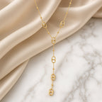 Collier Y en acier inoxydable doré à pendentifs maillons ovales et chaîne fine